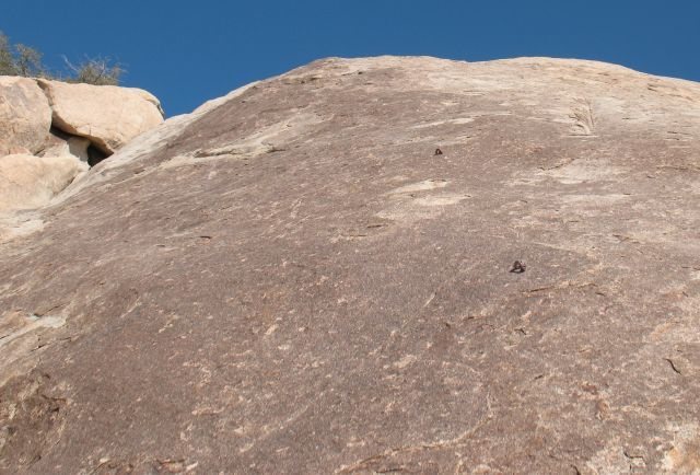 Looking up from the base of the Eva Slab, Joshua Tree NP