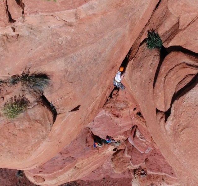 Leading the offwidth on P2.<br>
<br>
(Drone photo by Joey Taylor)