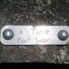 Placard at the start of "A Time for War"