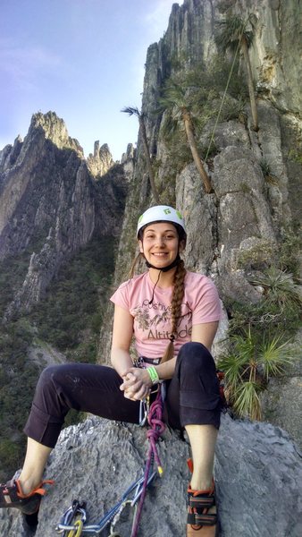 KLS at the top of "Will the Wolf Survive". Climbers are rappelling down from "Estrellita" behind her