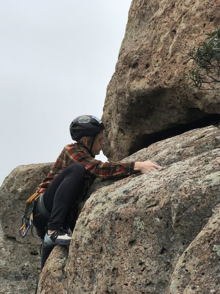 Coming up over the pillar.