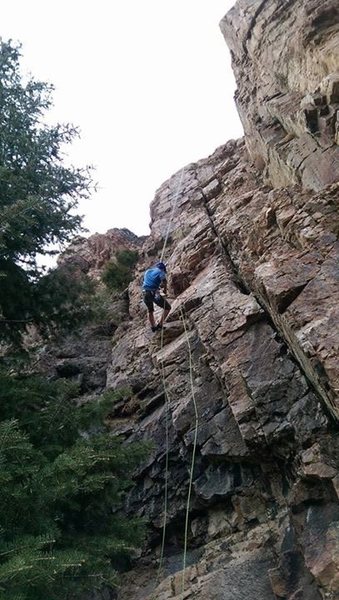 Coming down after climbing one of my uncles old FA's. He says stay off the crack or it's a 5.7