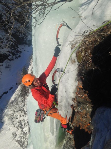 Pulling the last steep moves of the upper pillar of Rain Check.  Photo Constance Cloudberry Johnson