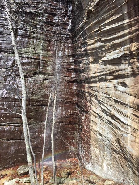 The route is a spring-time waterfall! Note the rainbow at the base. It's a lucky route?