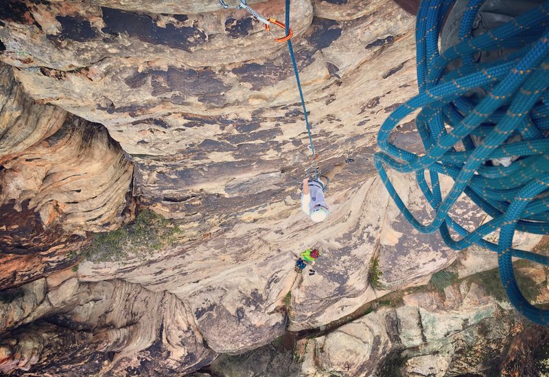 Accidentally belaying from the rappel anchors.