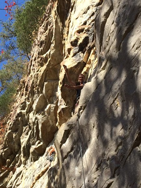 Gator chomping on the giant ledge in the middle of the route.
