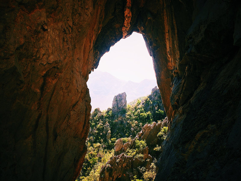 Intermediate belay on Pitch 1 with a nice window view.