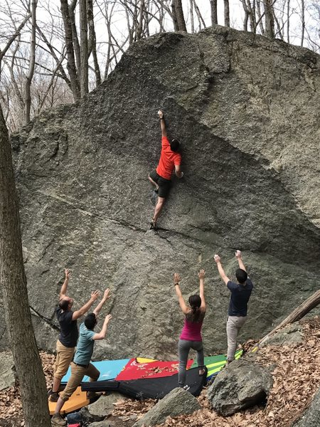 A high left foot to reach the sliver sidepull before the crux.