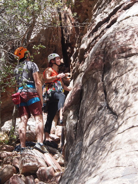 Molly starts off on P1; the "cave-ish" start is a few feet lower and to climber's right