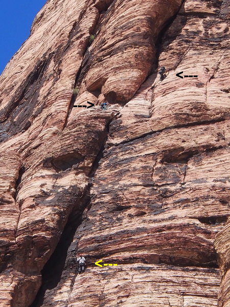 Lower climber nears crux of P2, upper climber starts off on P4 ("P3" if P2+P3 are combined) one climber at belay