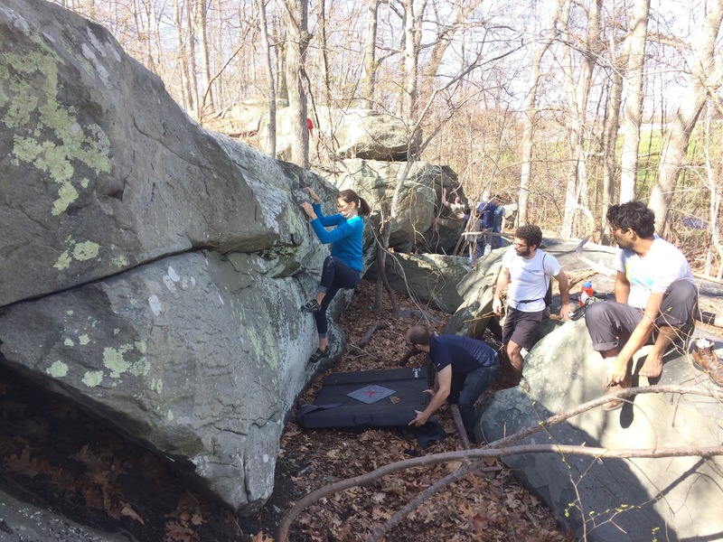Rachel on the first ascent. We cleaned poison ivy and debris to reveal the route.