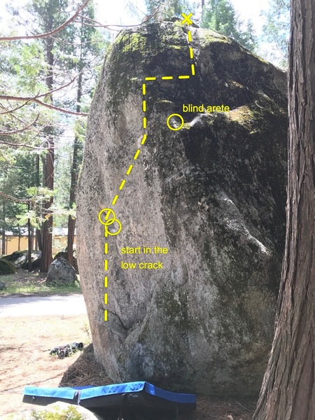 Climb the north (non-mossy face) until the holds run dry. Transfer over to the mossy sloped face to top.