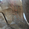 North Face. LOTS of bolts on this, fairly new with hangar and all (marked with stars). That's in addition to a million old studs without hangars which you can see if you zoom in.<br>
<br>
Also visible on the right is the back (east) side of the "Minor" boulder with another bolt ladder.