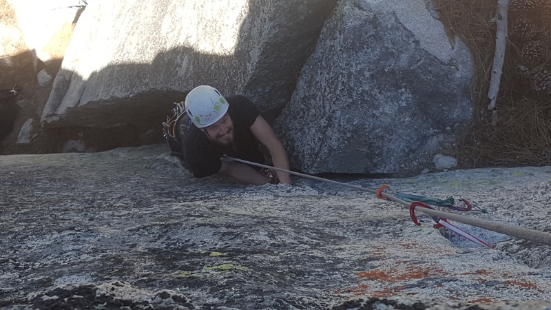 Coming out of the chimney up to the last big ledge! This is the best jamming of the route in my opinion!