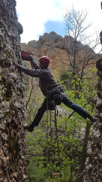 A precarious stem in a light rain while drilling the first bolt of Who Many So Manys 5.5 at Cragganzenden.