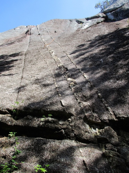 Dike on Pitch 1 of Sunblessed. Notice the chain hanging from the high first bolt. Even with the chain, the first clip is still rather high....