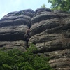 Enjoying the exhausting offwidth crux on a nice hot summer day.