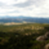 Panorama from the top. Walking off to climber's left is possible but a little brutal with all the boulders.