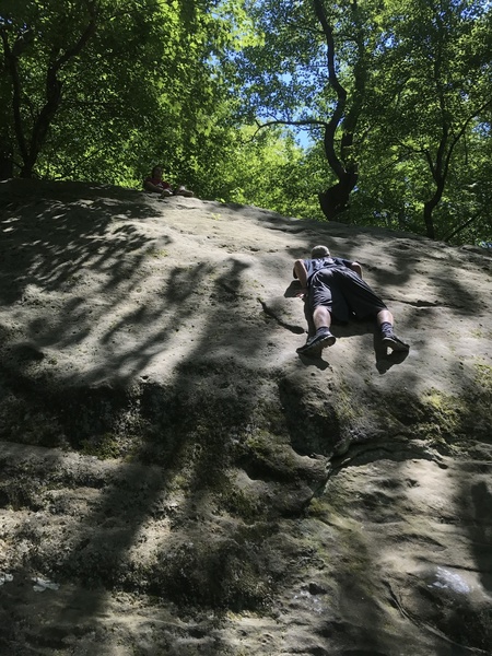 You take the right side of sunshine up and over the underhand grab on the crack. Get your feet up to your hands and walk the slab up