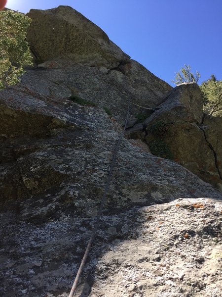 We chose the 5.8 crack to get over the bulge. Fun move over the lip.