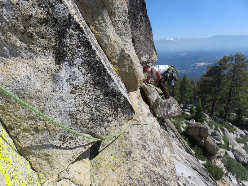 There are a few ways to surmount the summit block: a 5.10 offwidth around left (guidebook said it was around right which is a typo), a 5.10 on the prow, and a 5.6 around to the right. The prow looked a bit hard to protect, so we went around right, looking for the offwidth. Not finding the offwidth (since it was actually around left), we went up the 5.6 crack.