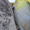 Climbing a groove to the Middle Summit.