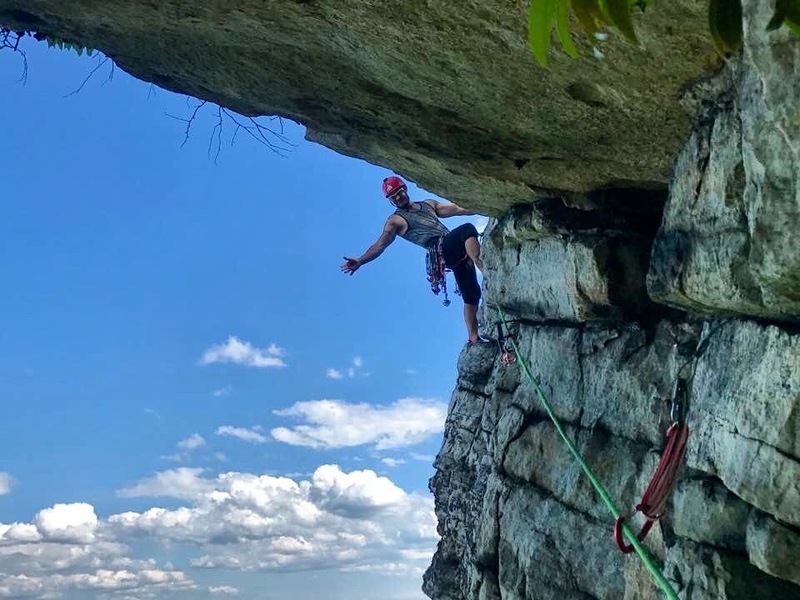 final pitch traversing under the roof to belay ledge