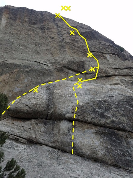La Cruz de la Norte Direct (10b) over the boulder. Cruz (9) starts off to the left