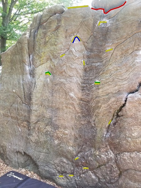 Start on green holds, yellow holds are what I used to get up. Red hold is on, for V0+ variation. Blue hold is off, for V3 variation.