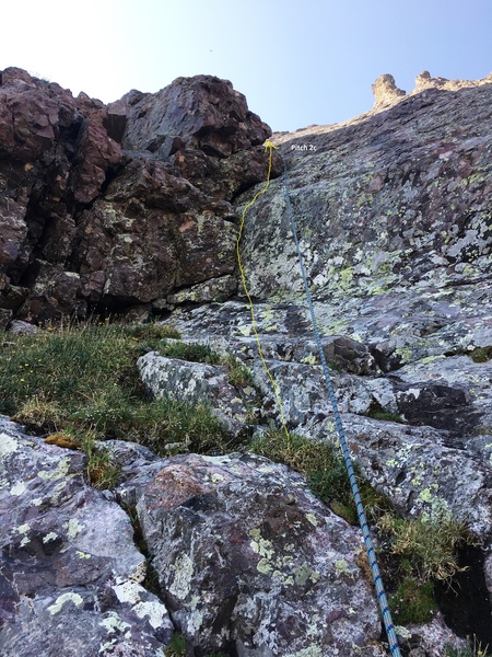 After climbing this easy boulder problem on the 2nd pitch, you'll have around 60 feet of 3rd Class to the second pitch anchor. 2c.
