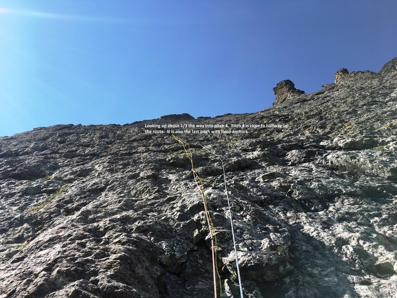 Climb up and slightly left into a wide gully system. Find the fourth pitch anchor of no return on the left side of the system.