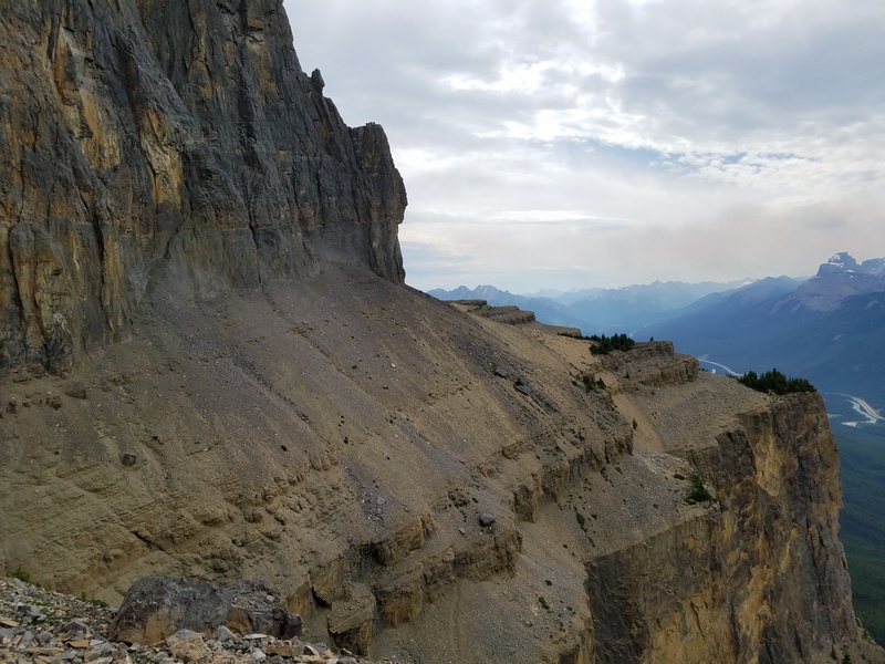 The approach trail once your past the hut is the faint line between the sheer steep cliff above and the crumbly sloping cliff below. Don't look down.