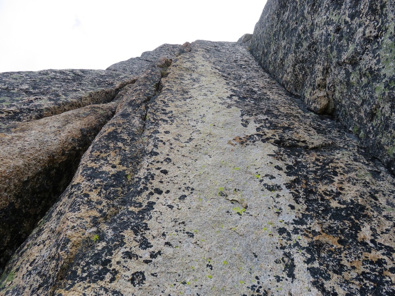 Pitch 3. Take the cracks on the left. This is the crux of the route (steep and slightly flaring).