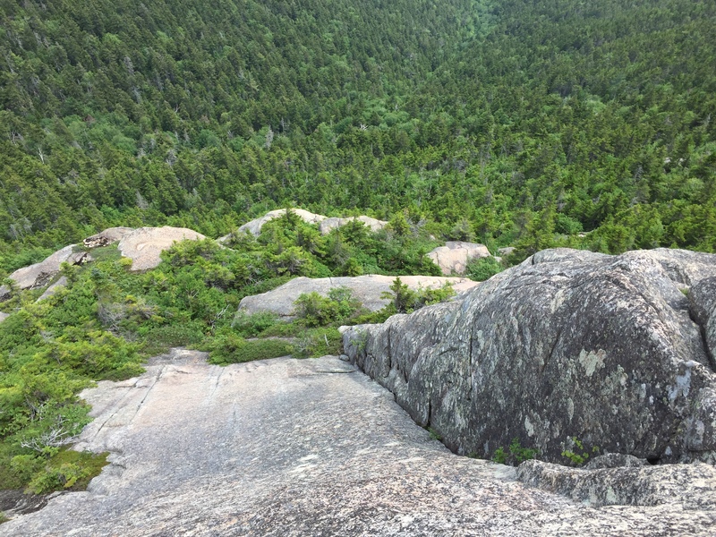 Looking down the upper corner crack. The pitch is about 70ft long. The lower pitch is about twice as long and just over the left knoll below.