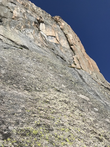 Pitch 6. Nebulous alpine terrain. Traverse 100' right to arrive at the base of the Gold Corner.