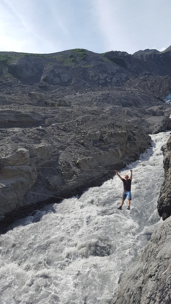 Dalton playing on the tyrolean Traverse while keeping his feet dry on the approach to Sunnyside and the Republic of Boulder