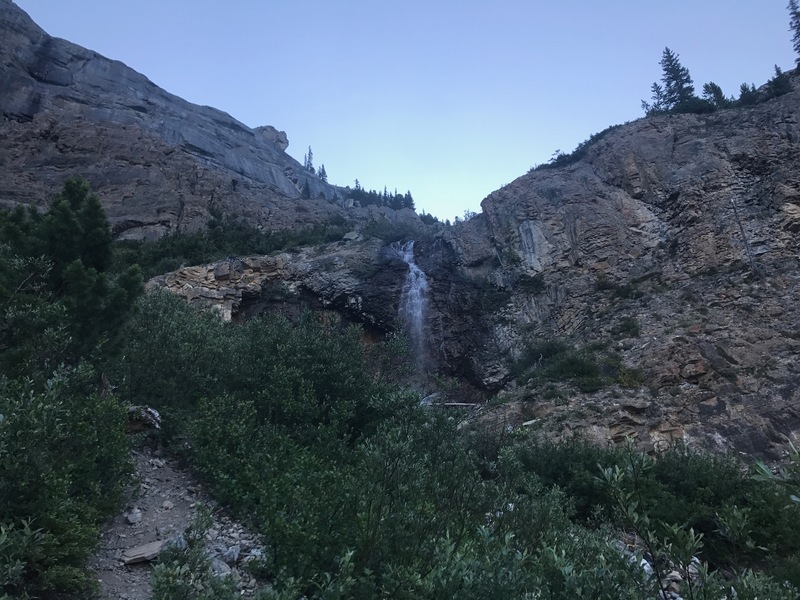 When you reach the first waterfall you'll cross the creek and ascend the rock band via climbers left.