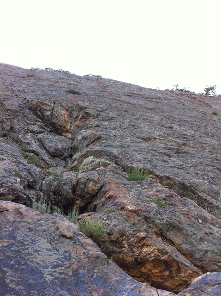 Look for this when walking up the scramble the route is just to the right of it