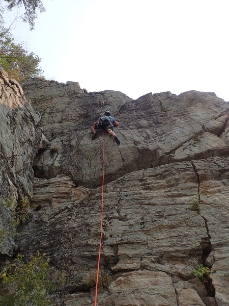 NN passing the crux on the first ascent.