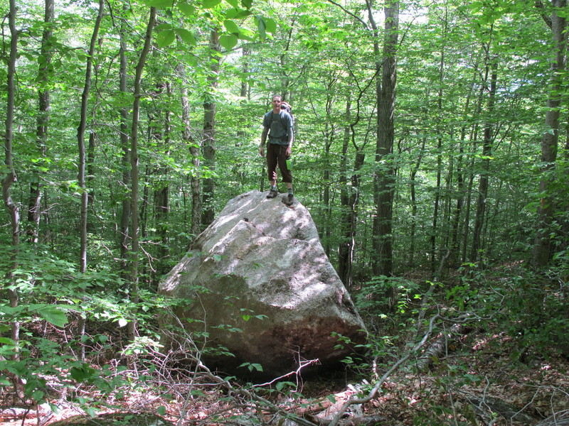 Lee Hansche gets the FA. This boulder plowed a path through the woods ...