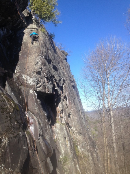 Jenna Damon heading up Yo Momma, a very fun and moderate slab route with awesome views.