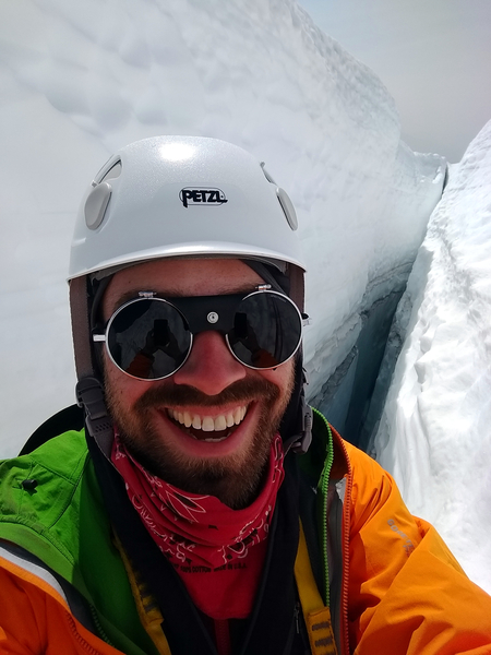 Crevasse rescue training. I was in the crevasse as a victim. I practiced using a waist and Texas kick prusik to climb the rope. I also practiced self-arresting my partners fall, setting up snow anchors and building a 3 to 1 and 6 to 1 pulley system to haul the victim out.