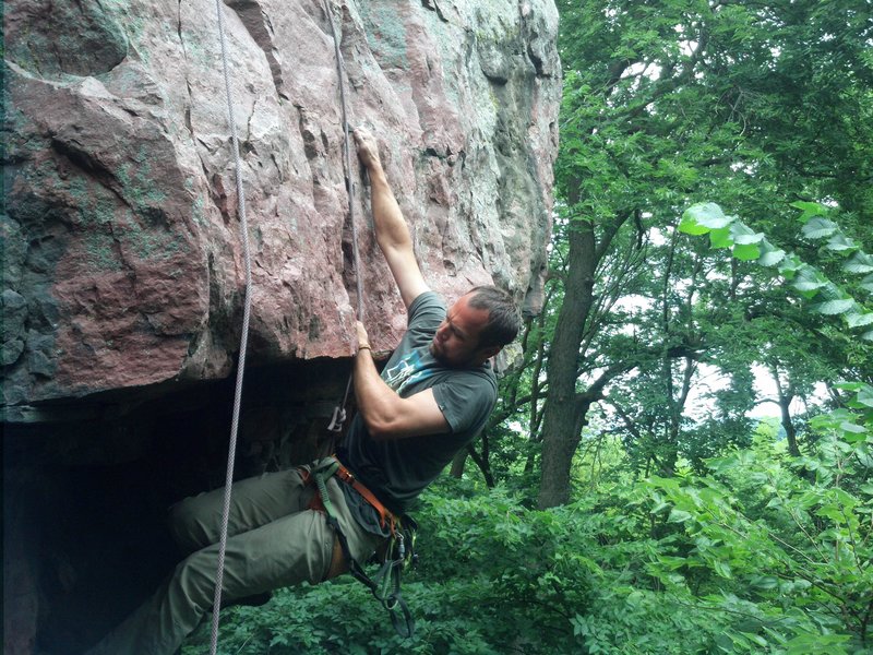 Pulling the roof crux.