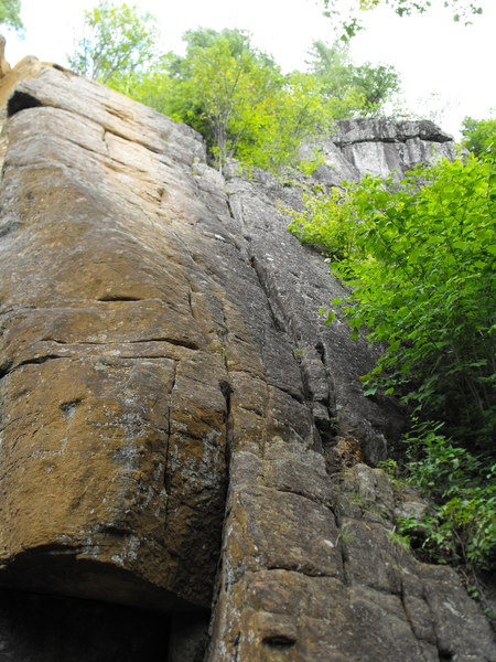 Route is on the right hand side in the crud filled gentle crack system (I think), there is a harder variation on the immediate left on clean dry rock.