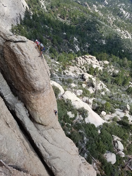 Unknown climbers on Fort Stress. One preparing to repel before continuing the climb.