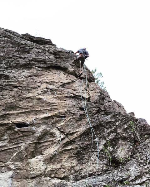 Rappelling upper portion of Six Pack 5.9+/10a at Mirabeau Park