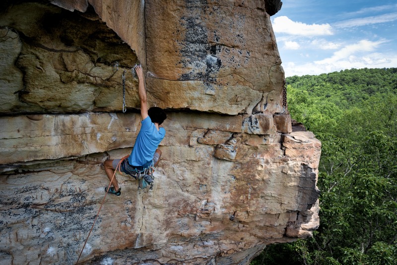 The bottom of the dihedral. Climber Ethan Micele.