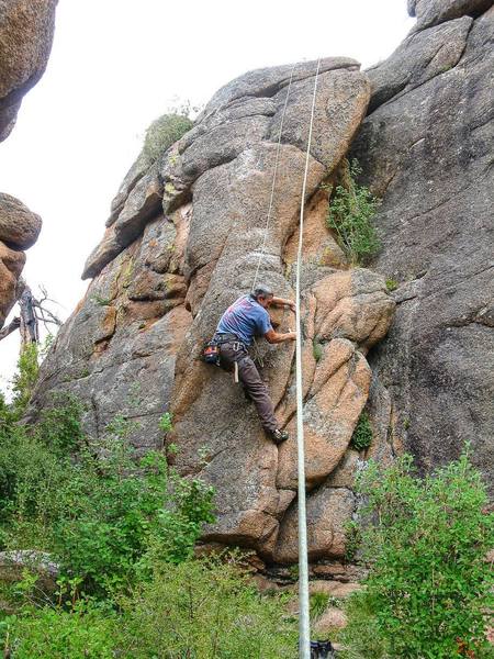 Some fat old guy marking the bolt placements.