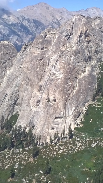 South face of Hamilton Dome. Yes, those are giant holes/caves w/ their own meadows and ecosystems.