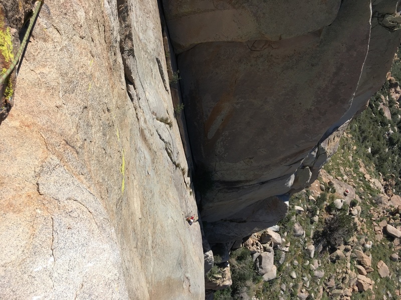 What not to do, ha! <br>
<br>
The bushy crack climbers right of Austin is correct. The crack he's is in is fun, but you'll receive no mercy with rope drag while pulling the crux and then on the final traverse to the belay.